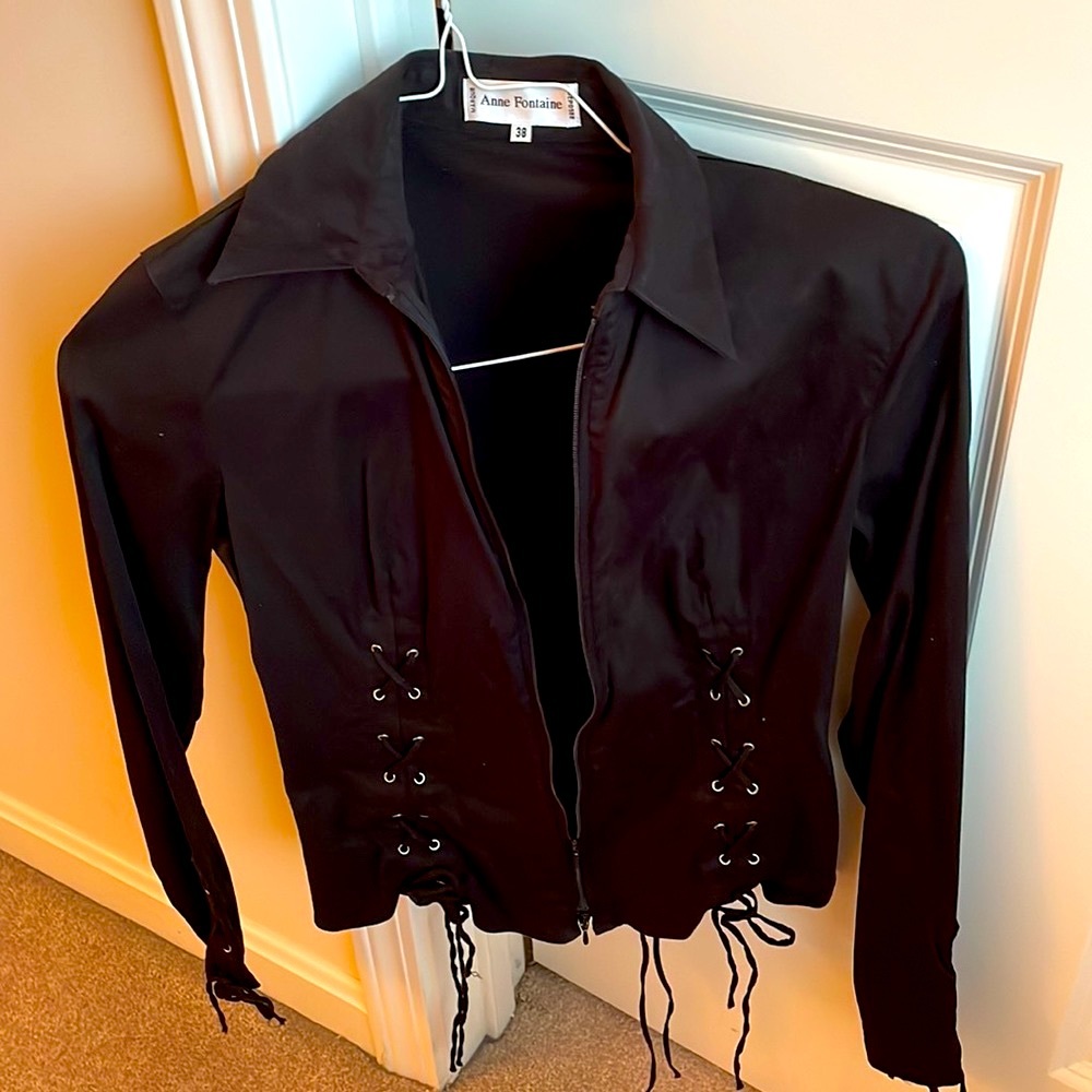 Black blouse . Zipper with tie details in front, back , sleeves Anne Fontaine